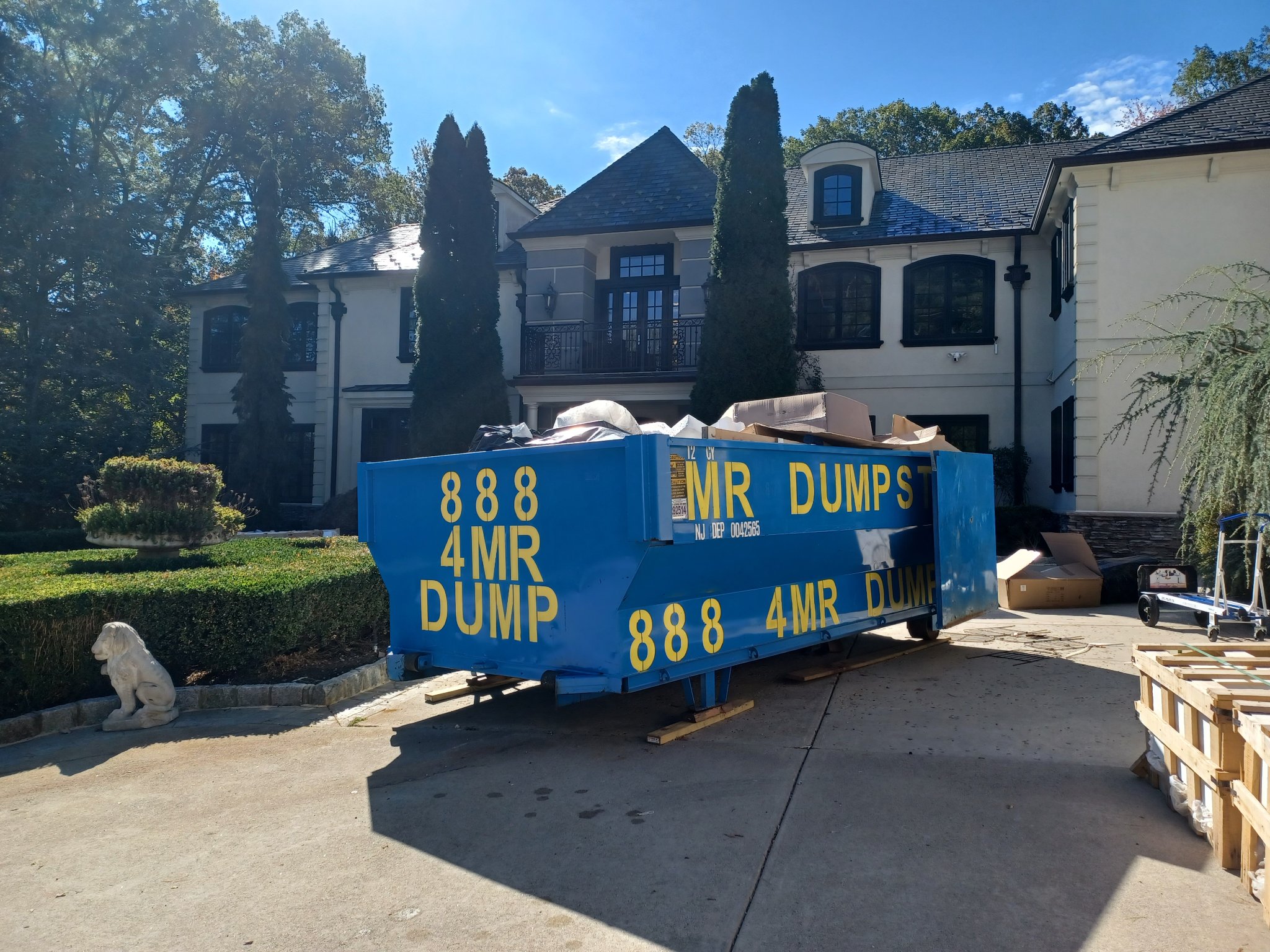 12 Yard Dumpster Rental | Mr. Dumpster | Bergen & Passaic County NJ 12 yard dumpster rental Bergen County NJ — Mr. Dumpster blue roll-off container for kitchen renovations and roofing tear-offs in Passaic County New Jersey